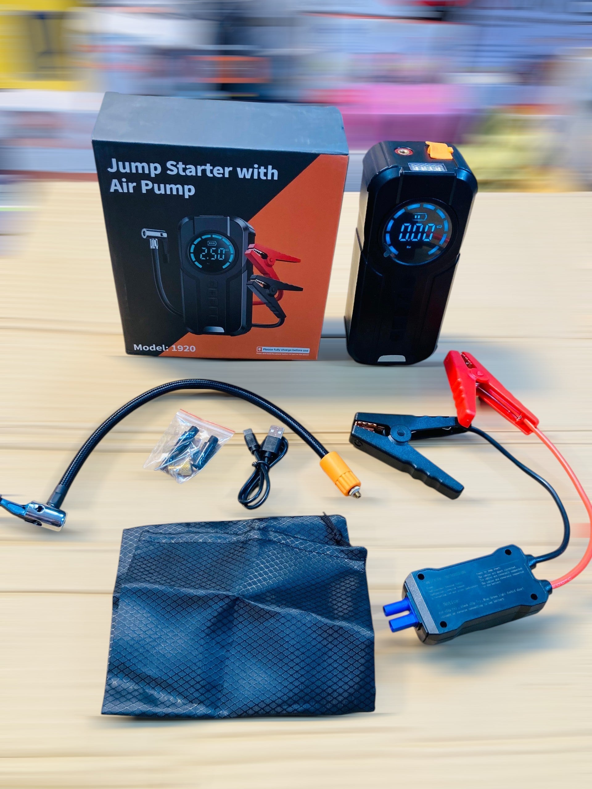 Imported 4-in-1 Emergency Portable Car Jump Starter with an Integrated Digital Air Compressor 1920