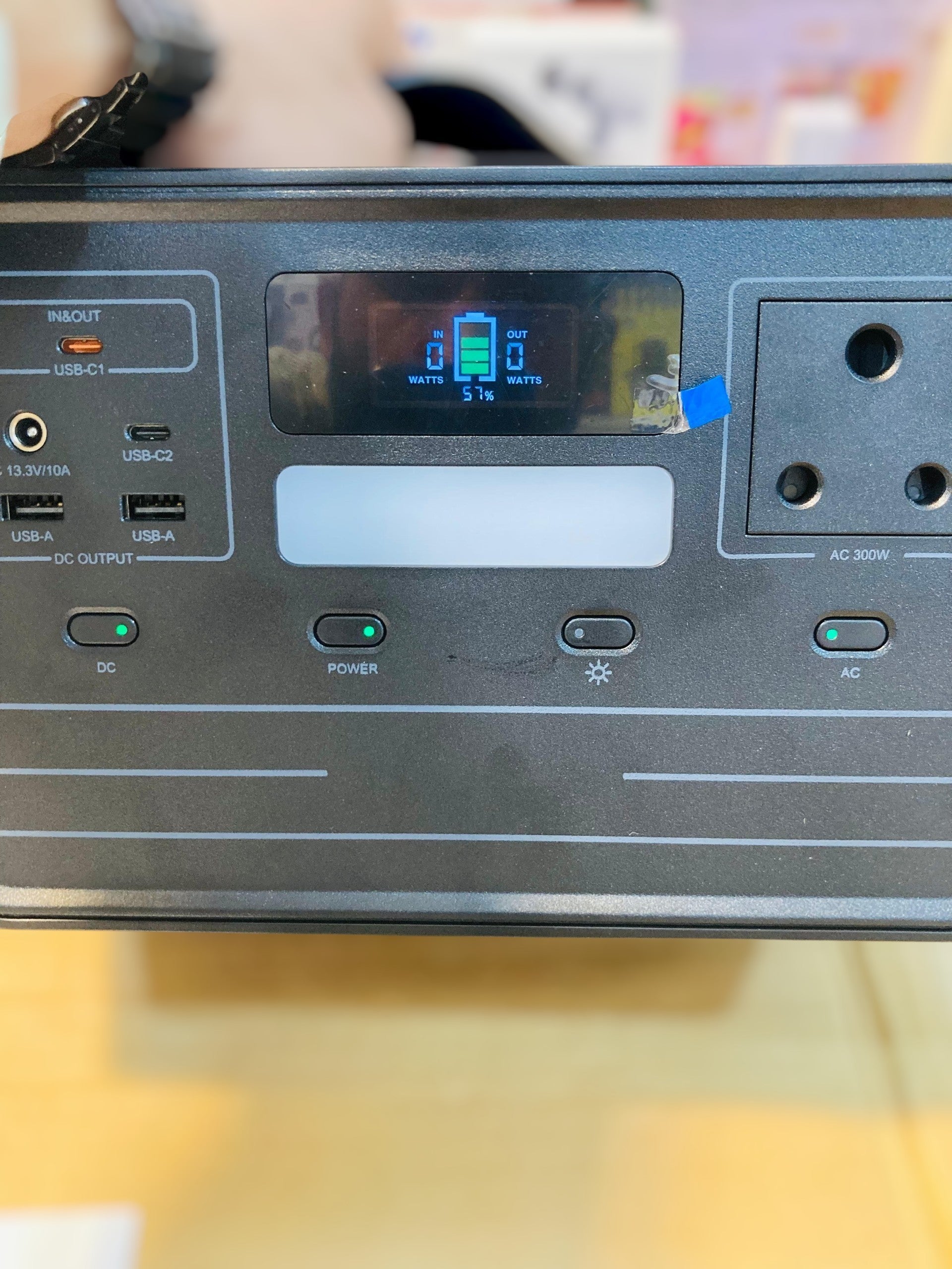Portable 300 Watt AC/DC Power Station with Digital Display and Integrated Handle A41029