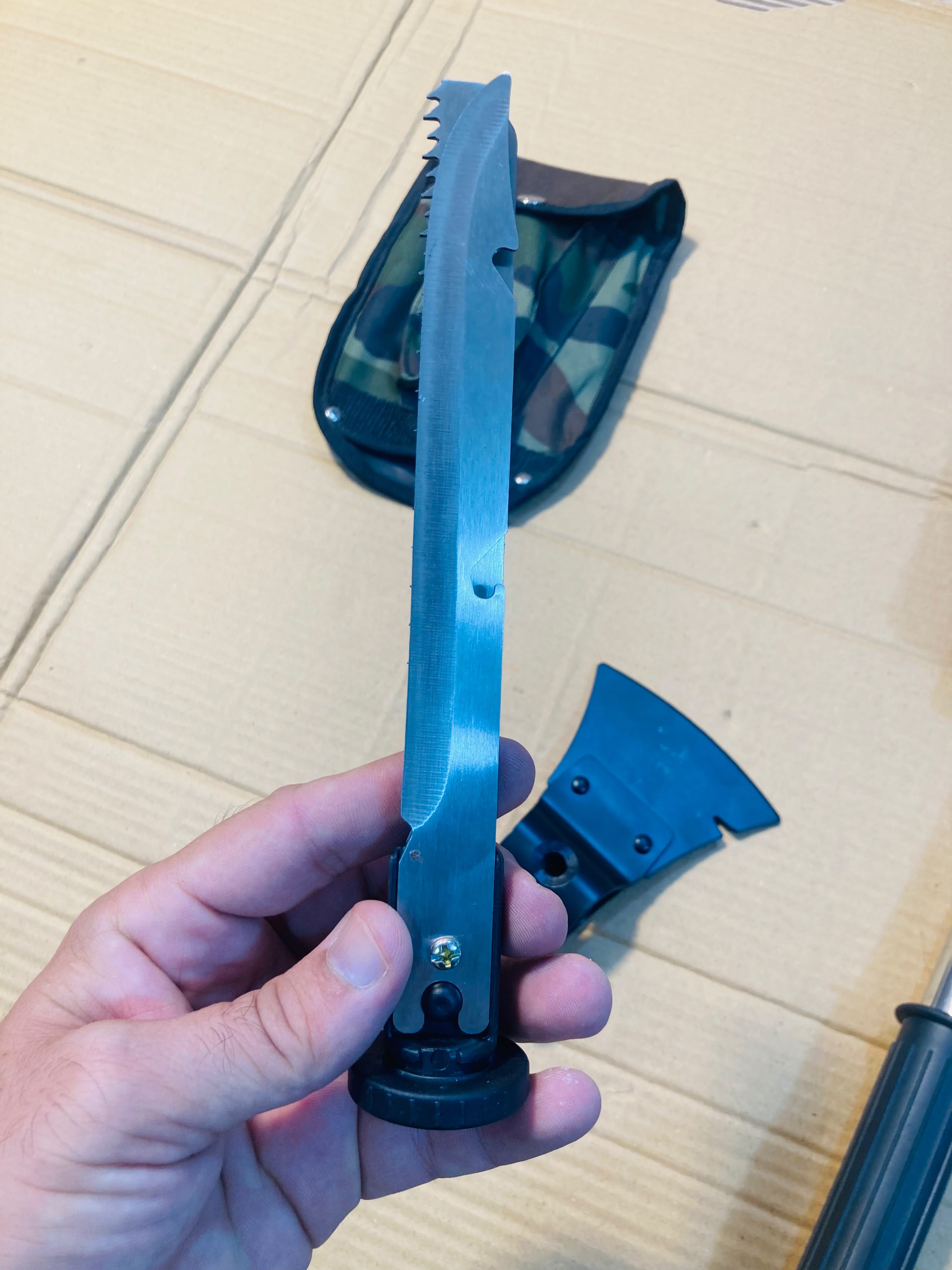 4-in-1 Multi-Tool Outdoor Camping Shovel, Axe, Saw, and Knife Set with Camouflage Carrying Pouch