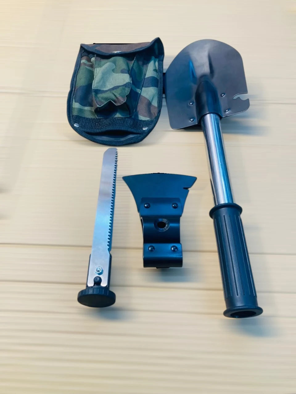 4-in-1 Multi-Tool Outdoor Camping Shovel, Axe, Saw, and Knife Set with Camouflage Carrying Pouch